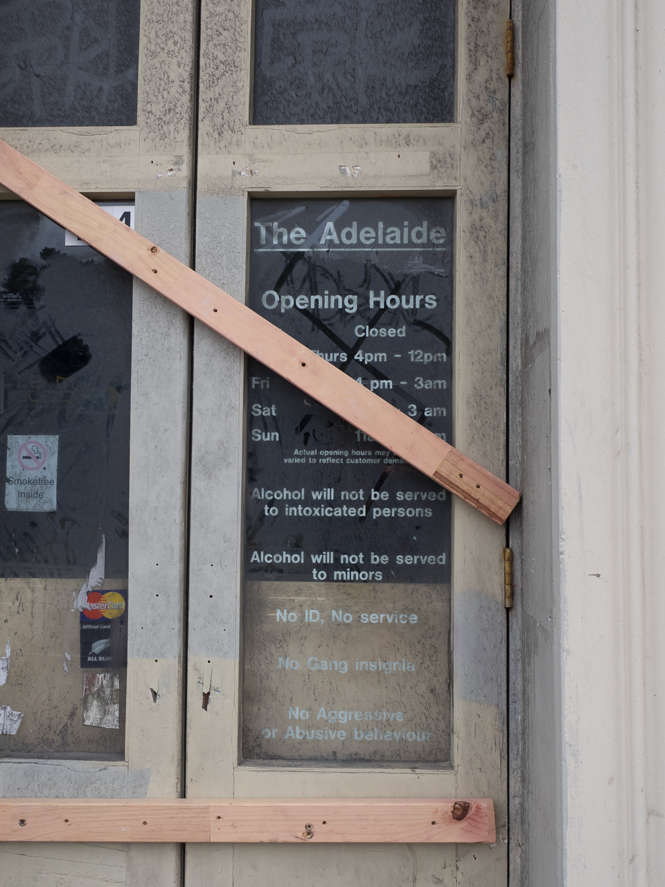 The boarded up Adelaide Road pub.